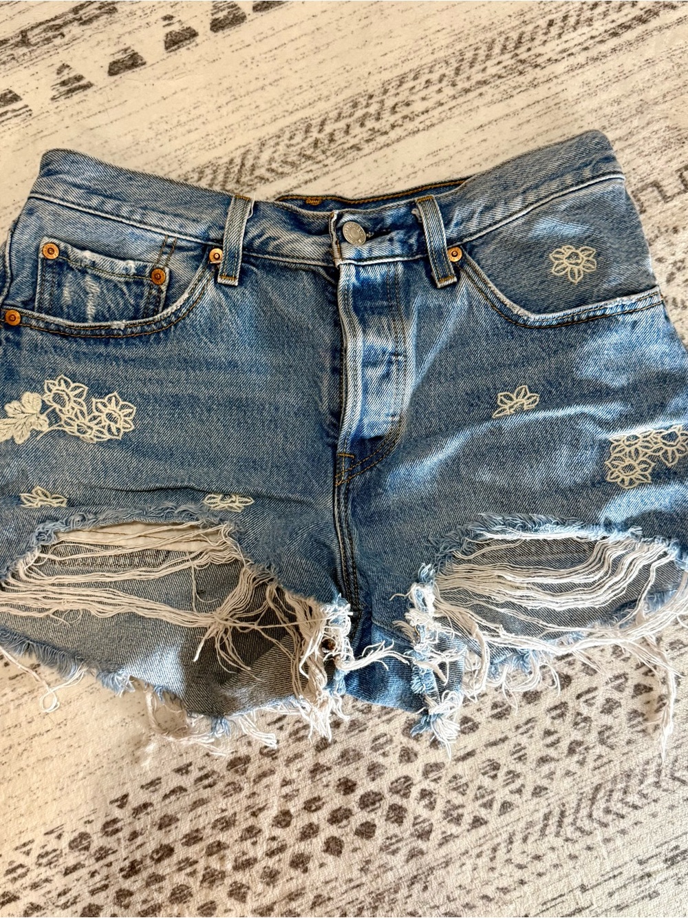 Levi's Light Blue Distressed Denim Shorts with White Floral Embroidery